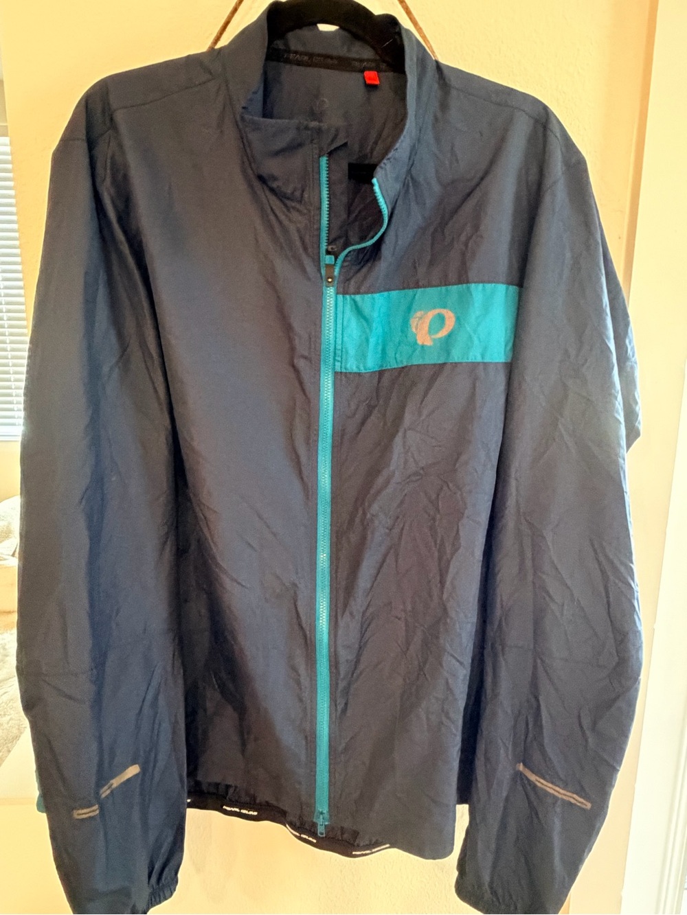 Pearl Izumi Navy Jacket with Teal Stripe and Zipper